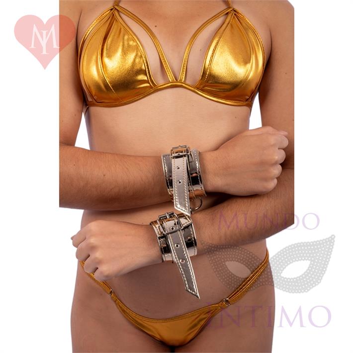 Esposas doradas de charol