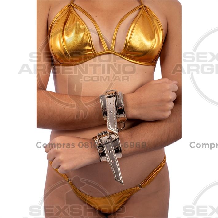 Esposas doradas de charol