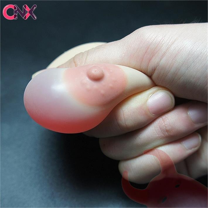 Llavero con forma de teta pellizcable