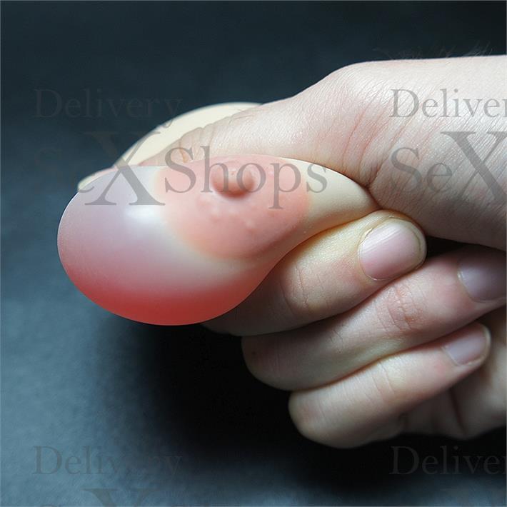 Llavero con forma de teta pellizcable