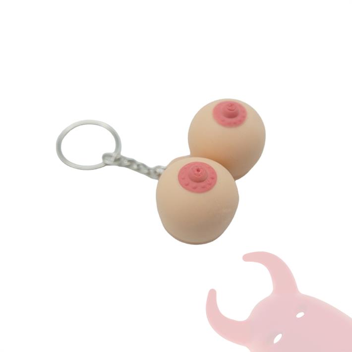 Llavero con forma de seno pellizcable