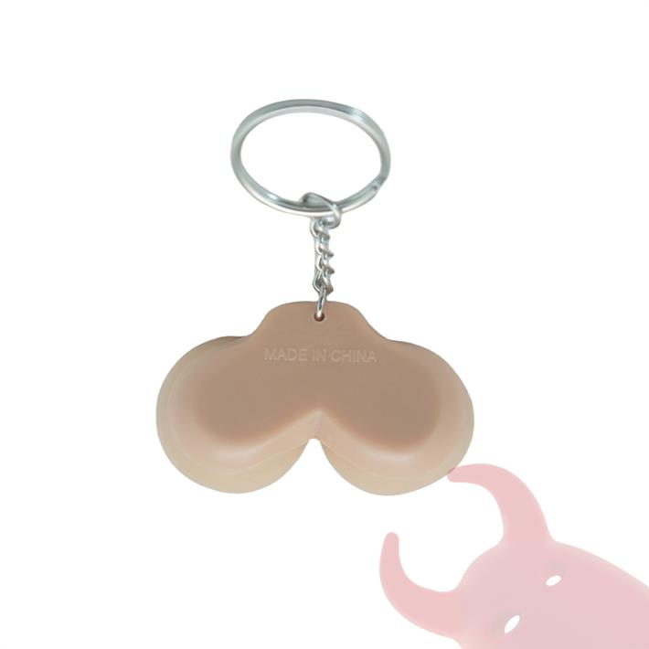 Llavero con forma de seno pellizcable