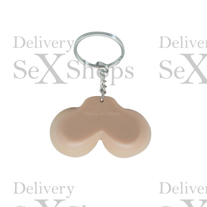 Llavero con forma de seno pellizcable