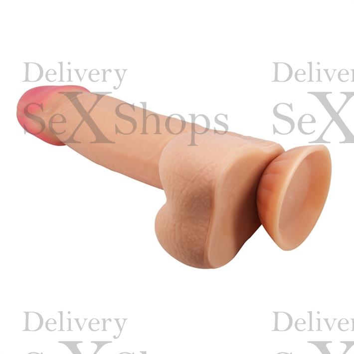 Dildo con testiculos vertebrado con sopapa flexible con piel extensible